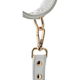 Catuse BDSM Bondage pentru glezne albe din piele artificiala cu lant detasabil si detalii metalice aurii, ajustabile