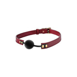 Ball gag BDSM reglabil din piele ecologica rosie cu bila din silicon 4.7 cm pentru jocuri bondage