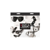 Set Bondage NS Novelties Sinful 4 Piese - Vinil Negru captusit cu Neopren - catuse pentru incheieturi, catuse pentru glezne, hogtie, masca pentru ochi